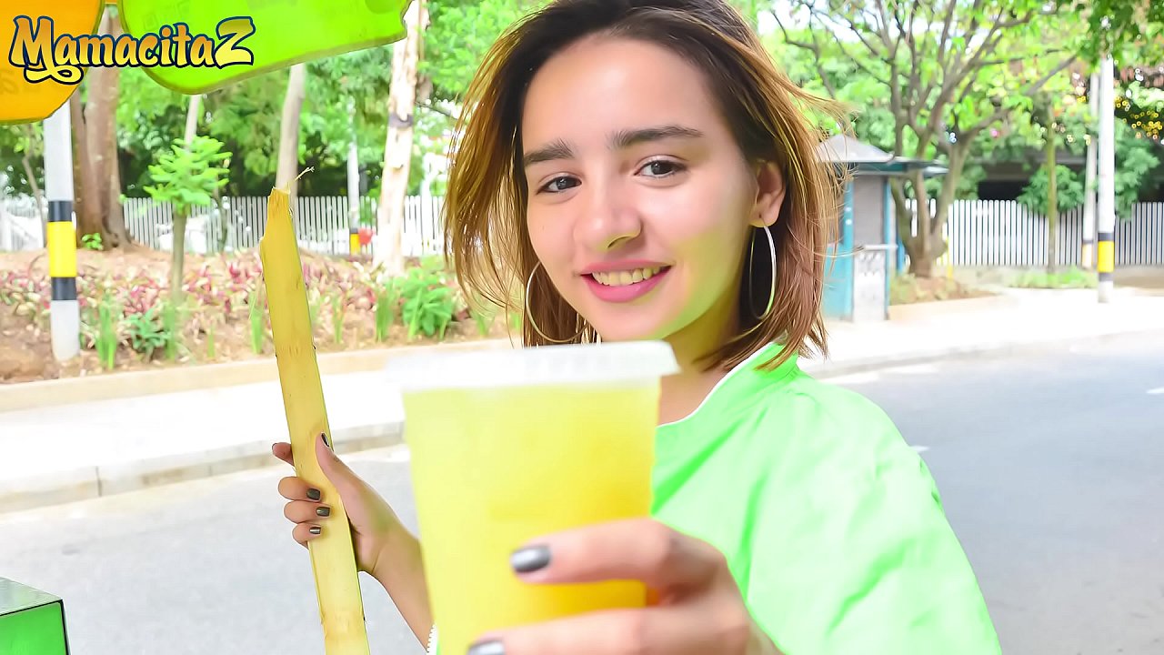 Young Colombian girl drinks a little juice and tastes a big fat cock